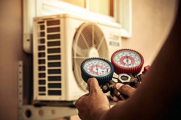 Professional Air Conditioning Service technician working in Bunker Hill, OR
